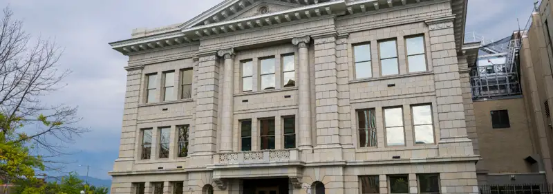 Exterior view of the East side of the Missoula County Courthouse on a cloudy day